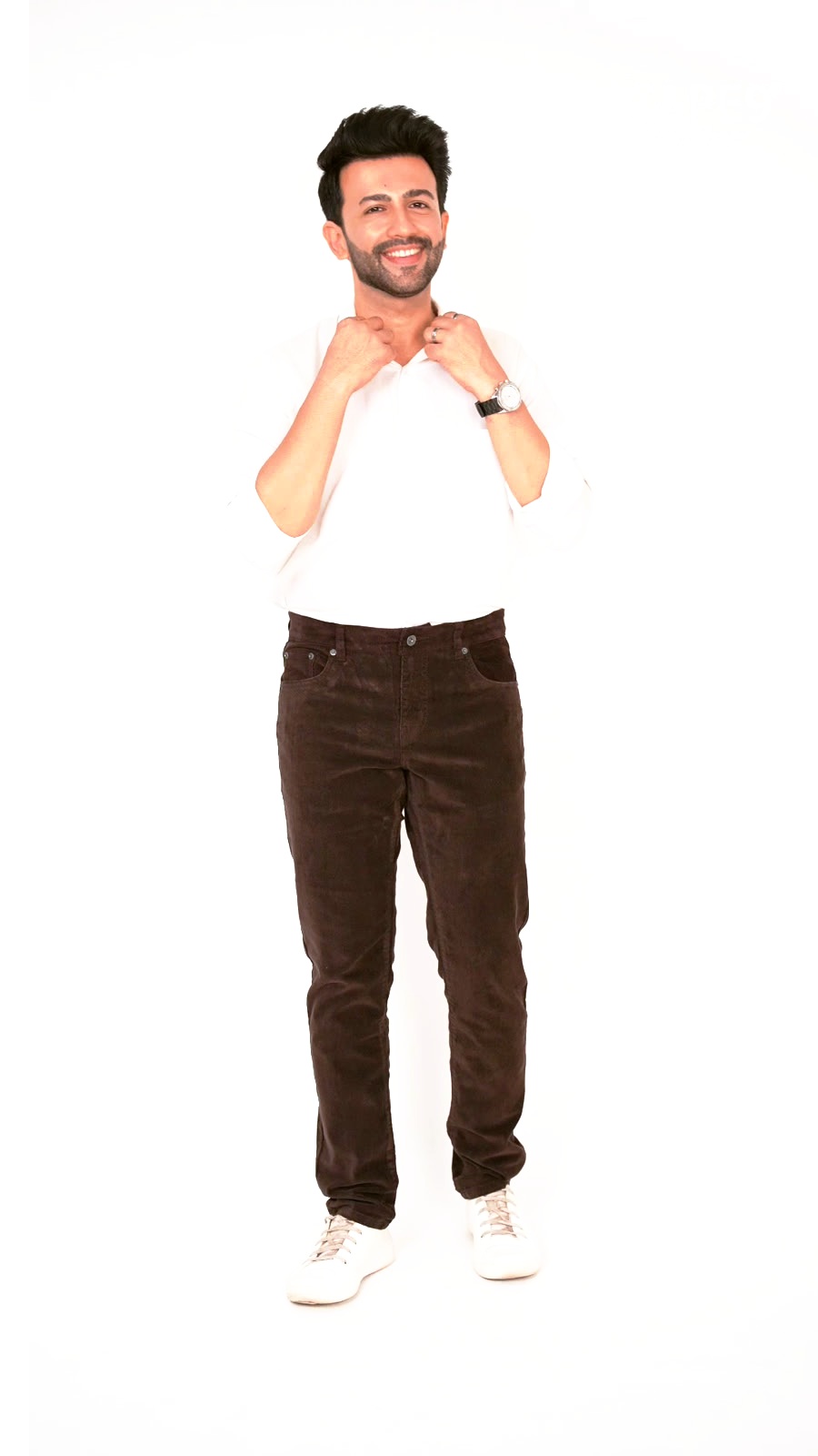Model wearing CAPE-9 corduroy comfort-fit pants in Coffee brown